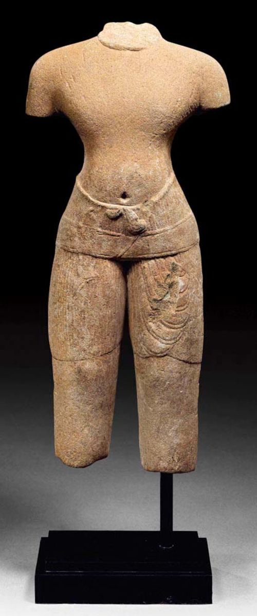 SANDSTONE MALE TORSO.Khmer, Baphuon style, 11th century. H 46 cm.