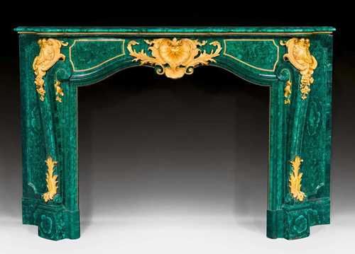 IMPORTANT MALACHITE FIREPLACE BORDER,Louis XV style, probably Russia. Malachite with matte and polished gilt bronze. 180x47x126 cm