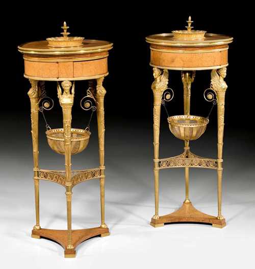 PAIR OF ATHENIENNES,late  Empire, after designs by C. PERCIER (Charles Percier, 1764-1838) and P. FONTAINE (Pierre F.L. Fontaine, 1762-1853), in the style of JACOB FRERES RUE MESLEE Paris, 19th century Burl elm veneer. With 3 winged caryatids and bowl, set on a three-sided plinth. D 42 cm, H 100 cm. Provenance: from a French collection