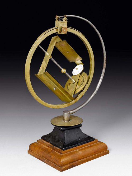 A PRECISION SUNDIAL, Southern Germany, late 18th c. With monogram JPF (possibly J.P.Fischer). Engraved and gilt brass, iron and enamel. Semi-circular steel frame on rectangular wooden shaft holding the moveable mechanical sundial with meridian arc and fixed polar axis. With 3 cogwheels connected to clock dial showing the hours and minutes. H 40 cm.