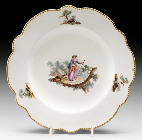 PLATE WITH LANDSCAPE PAINTING AND 'LARGE FIGURE' DECORATION, ZURICH, CIRCA 1770-80.Underglaze blue mark Z, impressed mark k I. D 24 cm. Chipped foot edge. Provenance: E. Caviglia, Lugano, 2000. Comparable pieces: Ducret I, ill. 99, 100.