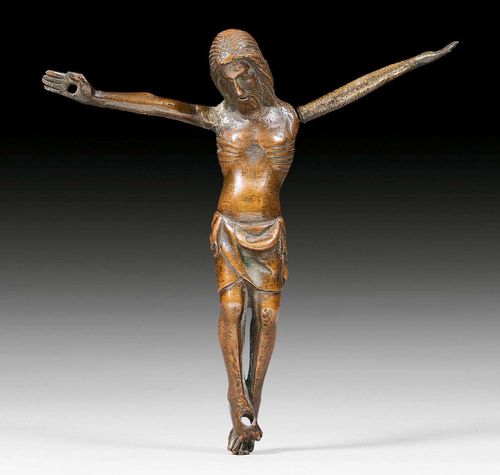CORPUS CHRISTI,Italy, late 13th/early 14th century. Solid cast bronze with brown patina. Three-nail type. L 15, W 15 cm. One arm probably later replaced, the other repaired.