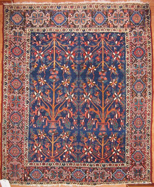 AFSHAR antique. Blue central field with plant motifs, brown trim, signs of wear, 120x105 cm.