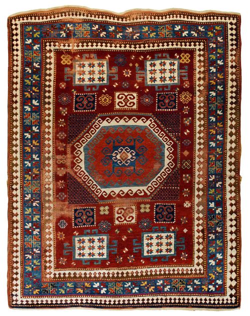 KARATCHOPH antique.Red central field geometrically patterned in white, blue and green, blue border, strong signs of wear, 175x225 cm.