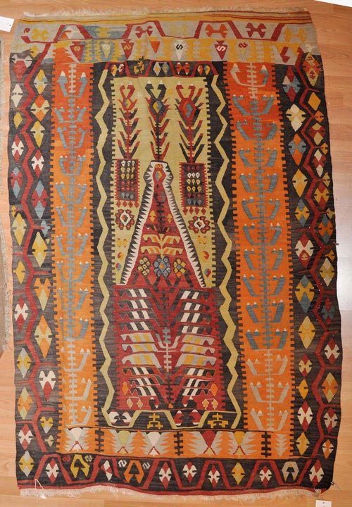KILIM ANATOLIAN, old.Red mihrab with yellow spandrels and a black frame, geometrically patterned with stylised plant motifs, orange border, slight wear, 130x180 cm.