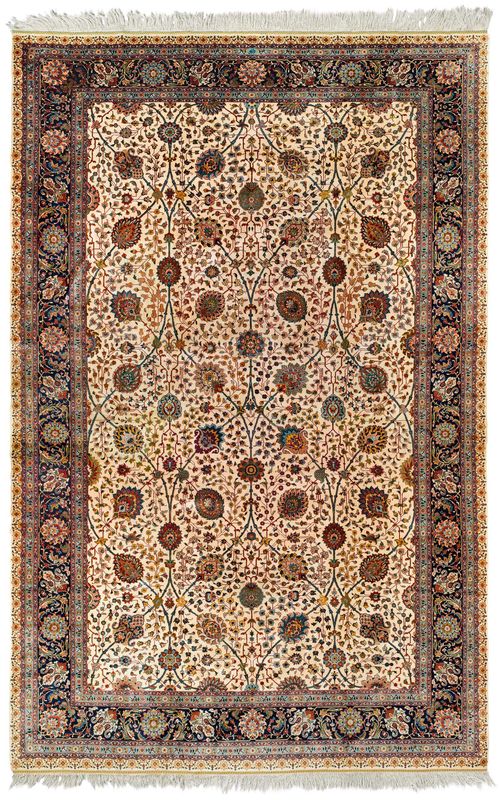 TABRIZ old.Beige ground, patterned throughout with flowers and palmettes in harmonious colours, dark blue border, good condition, 345x540 cm.