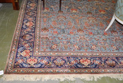 TABRIZ old.Turquoise central field patterned throughout with floral motifs in delicate pastel colours, black border, good condition, 275x360 cm.