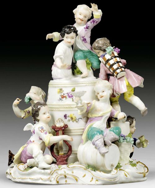 GROUP OF CHILDREN WITH WINE BARREL AS POT-POURRI HOLDER, MEISSEN, CIRCA 1760.Allegory of Autumn, comprising a group of children at the grape harvest. Two children on the lid and the rocaille plinth heightened in gold and with applied flowers and leaves. Underglaze blue sword mark. H 22.3cm. Provenance: Private collection, Switzerland