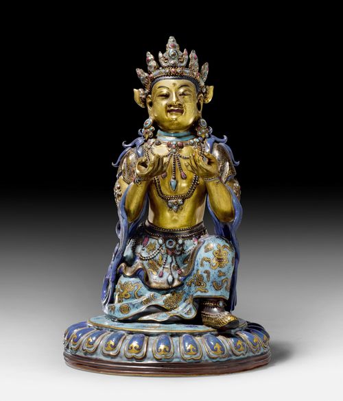 A GILT AND ENAMELED PORCELAIN FIGURE OF THE KNEELING NAGARAJA. China, late Qing dynasty, height 28.5 cm.
