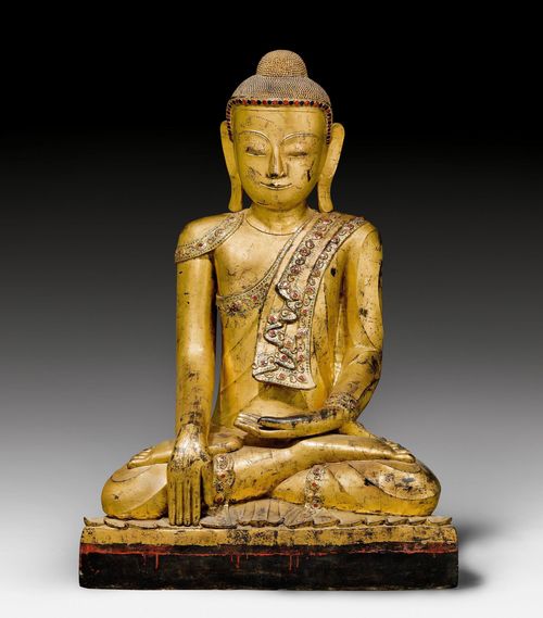 A GILT DRY LACQUER FIGURE OF THE SEATED BUDDHA SHAKYAMUNI WITH GLASS INLAYS. Burma, Shan style, 19th c. Height 111 cm.