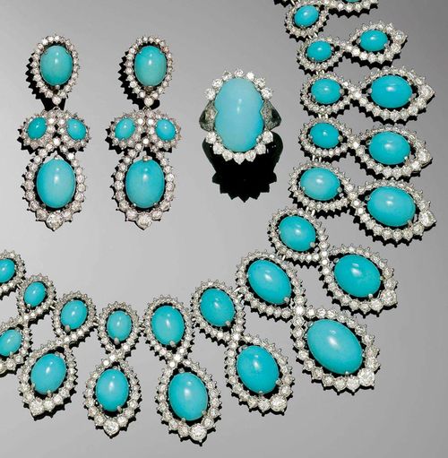 TURQUOISE AND DIAMOND SET, KERN, Paris, ca. 1970. Platinum 950 and white gold 750. Very decorative, elegant platinum necklace set with 57 fine oval turquoise cabochons  of 6 x 5 to ca. 16 x 12 mm each in a surround of brilliant-cut diamonds, arranged in two rows, graduated, signed Kern Paris, No. 5.087. L ca. 45. Matching white gold clip earrings, each with 4 turquoise cabochons and 67 brilliant-cut diamonds, signed No. 5.095, and a platinum ring set with one turquoise cabochon, 14 brilliant-cut diamonds and 18 single-cut diamonds, signed, No. 9299. Size ca. 56. Total weight of the diamonds ca. 27.00 ct.