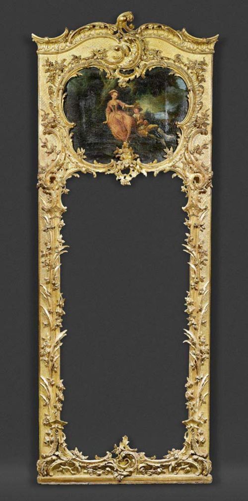 OVERMANTEL MIRROR,Louis XV, probably after designs by J.M. HOPPENHAUPT (Johann Michael II Hoppenhaupt, 1709-1769), Potsdam circa 1745/55. Pierced and exceptionally finely carved gilt wood with cartouches, flowers, leaves and frieze. Replaced mirror plate. H 250 cm, W 97 cm.