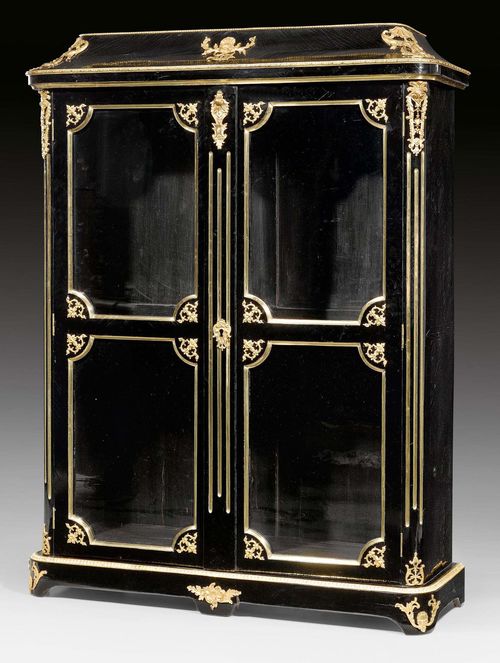 LIBRARY VITRINE,Regence/Louis XV, stamped M. CRIAERD (Mathieu Criaerd, maitre 1738), Paris circa 1730/50. Fluted wood, later lacquered black on all sides. Exceptionally rich, matte and polished gilt bronze mounts and applications. Restorations. 132x45x182 cm.