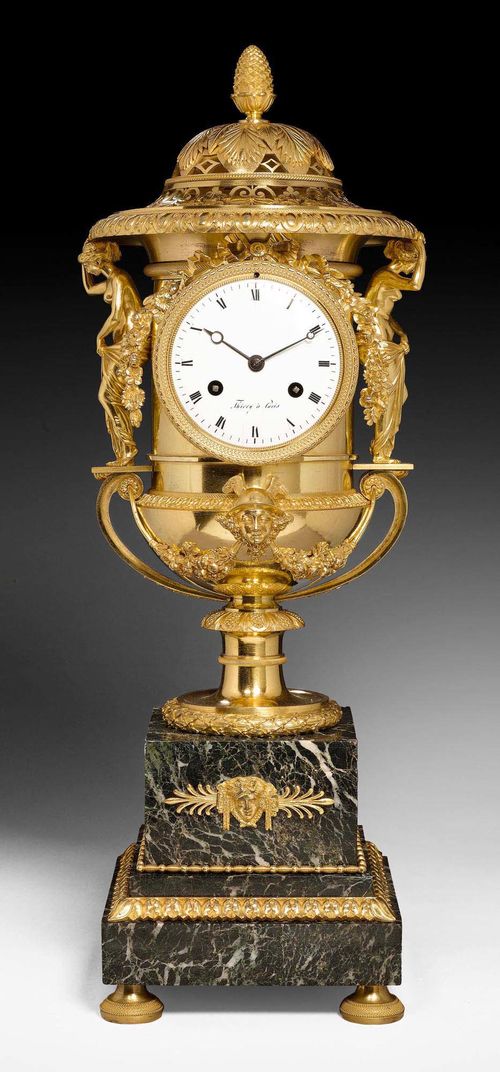 IMPORTANT VASE CLOCK "AUX CARIATIDES",Empire, the model attributed to C. GALLE (Claude Galle, maitre 1786), the dial signed THIERY A PARIS (active 1810/1830 Rue de Harley), Paris circa 1815. Gilt bronze, brass, and "Vert de Mer" marble. The clock with enamel dial Paris escapement striking the 1/2 hours on bell. Gilt mounts and applications. 18x18x59 cm.