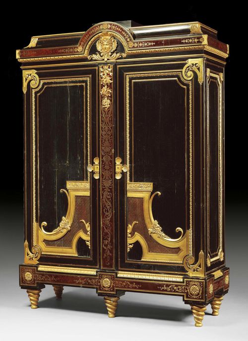 IMPORTANT CABINET "AU MASCARON",Louis XIV style, after designs by A.C. BOULLE (Andre Charles Boulle, 1642-1732), probably from the workshop of J. CREMER ( Joseph Cremer, born 1811), Paris, 19th century, parts with older elements. Ebony, exceptionally finely inlaid with tortoiseshell and engraved brass fillets in "premiere partie". Front with double doors, inside also with fine marquetry. Exceptionally fine, matte and polished gilt bronze mounts. Requires restoration. 145x48x200 cm.