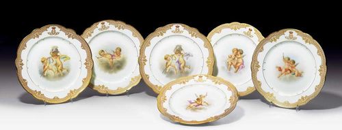 SIX PLATES FROM A SERVICE FOR TZAR ALEXANDER II., St. Petersburg, circa 1855.Each plate painted with putti, with gold lattice border and a crowned A monogram, with gilt edges. Factory mark of the imperial porcelain factory under Tzar Alexander II. (4 plates) and  III. (2 plates) in blue and green. D 22cm. 1 plate restored on the rim