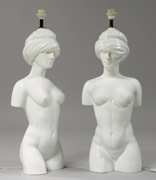 PAIR OF LARGE TABLE LAMPS,modern. White ceramic designed as a female nude, bottom signed illegibly. White fabric shade. H 115 cm.