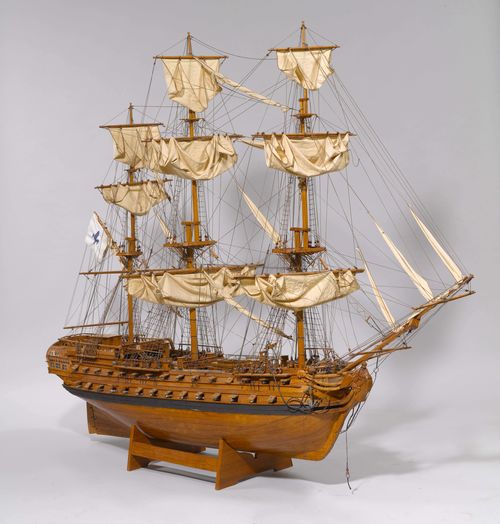 LARGE MODEL OF A THREE-MASTER,20th century. Wood, metal and twine. Finely worked model with numerous cannons and anchors. 172x130 cm.