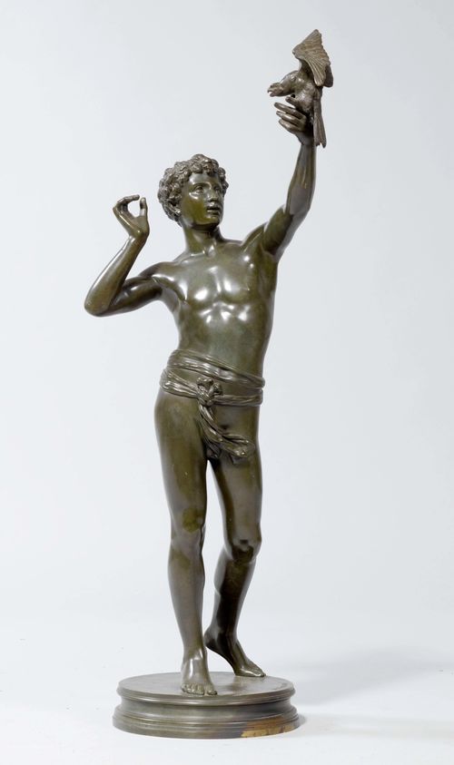 THABARD, ADOLPHE MARTIAL (1831-1905). Bronze. Sculpture of a young boy standing and holding a bird of prey in his left hand. On a round base, signed "A. Thabard". H 77.5 cm.