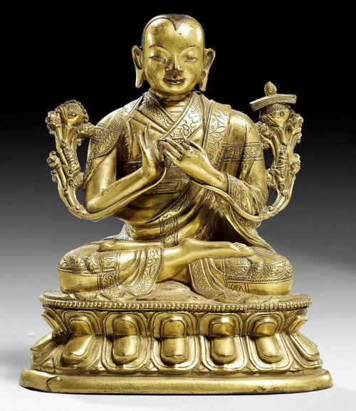 A GILT COPPER ALLOY FIGURE OF A HIGH RANKING MONK. Tibeto-chinese, 18th c.  Height 15.5 cm.