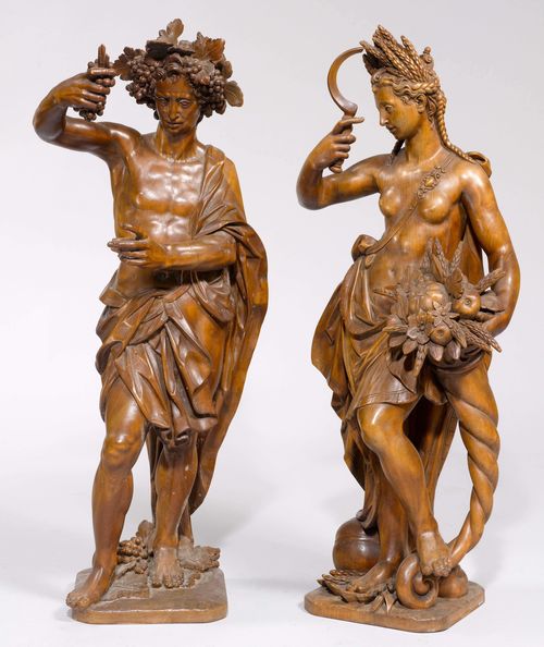 FIGURES OF CERES AND BACCHUS,Germany, in the style of ca. 1611, after designs by Hans Krumper (Weilheim ca. 1570 - 1634 Munich), Copies from the beginning of the 20th century. Walnut, carved full round. Bacchus as the Allegory of Autumn and Ceres as the Allegory of Summer. H 94 cm. Provenance: Gut Aabach, Risch am Zugersee.