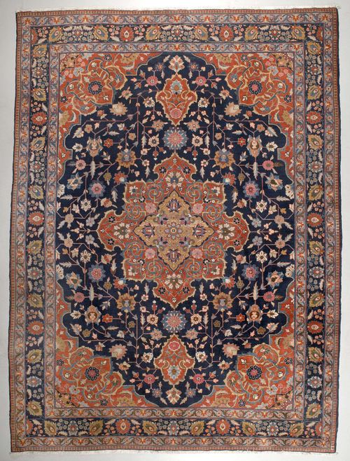 BACHTIAR CARPET antique. Blue ground with a red and beige central medallion and corner motifs, the entire carpet is patterned with flowers and palmettes, blue border, signs of wear, 285x390 cm.
