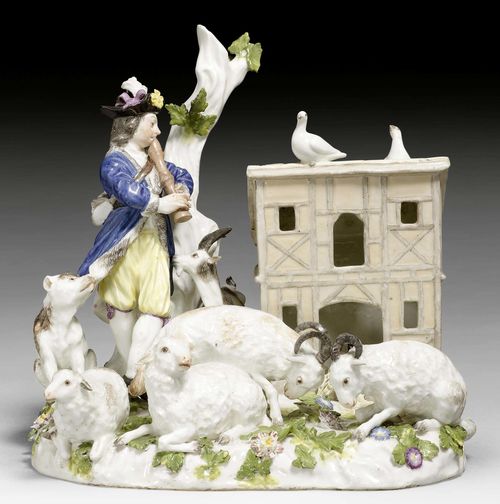 RARE SHEEPHERDER GROUP, MEISSEN, MODEL JOHANN GOTTLIEB EHDER, CIRCA 1745.Underglaze blue sword mark. H 18.7cm, L 17.5cm. Minor chips and restored.