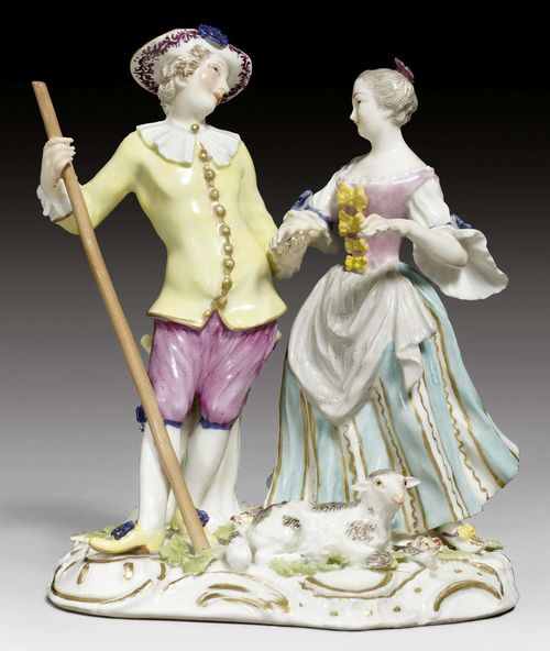 SHEPHERD COUPLE, MEISSEN, MID 18TH CENTURY.Underglaze blue sword mark on the back of the base. Impressed form number 143. H 14.5cm. Restored and chipped.