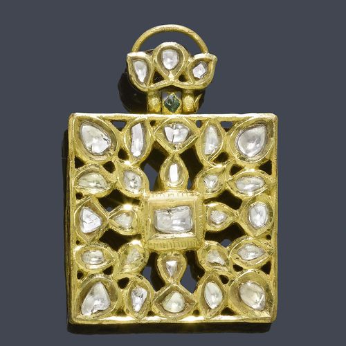 AN INDIAN 18TH C. ENAMEL AND TAWIZ PENDANT. Yellow gold. Exceptional quadrangular gold pendant with pierced surface set with 50 square-cut diamonds. The edges decorated with white, green and red enamel, slightly chipped. The loop with a lotus pattern set with 6 diamonds and green enamel. Ca. 4 x 4 cm.