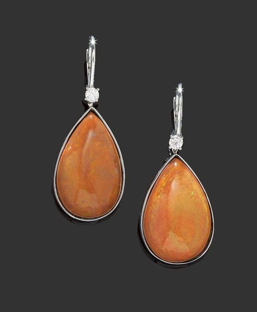OPAL AND BRILLIANT-CUT DIAMOND PENDANT EARRINGS. White gold 750. Casual elegent pendant earrings, set with 2 large Ethiopian opal drops in shades of red and brown, mounted under 2 brilliant-cut diamonds totalling ca. 0.18 ct.