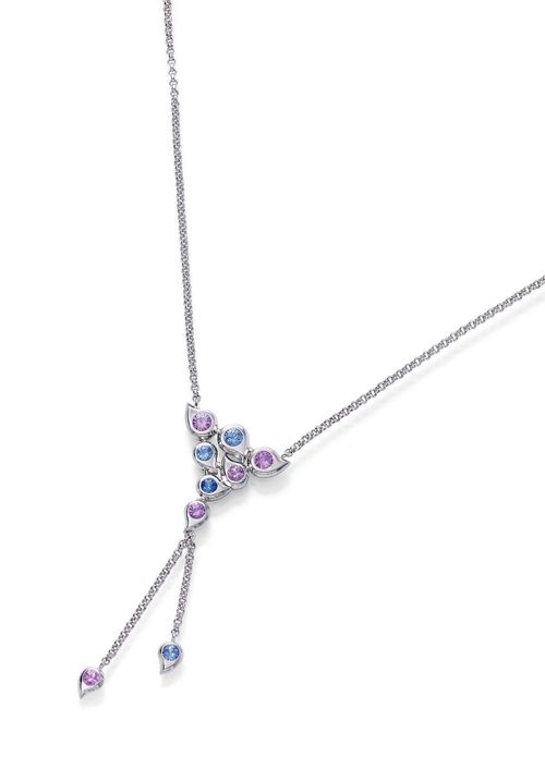 SAPPHIRE AND GOLD NECKLACE, TAMARA COMOLLI. White gold 750, 17g. Decorative necklace, the centre designed with 7 drop motifs set with blue and pink sapphires. The lower part with 2 chain pendants with drops set with sapphires. Total weight of the sapphires ca. 1.35 ct. L ca. 42 cm.