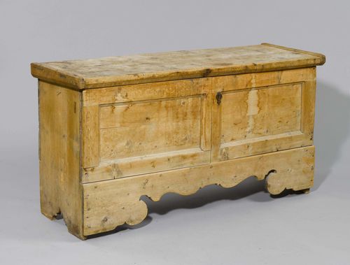 CHEST,Grisons, 18th/19th century. Pine with carved monograms. Rectangular body on a carved base. Recessed front converted to double-doors. 162x55x83 cm. Losses.
