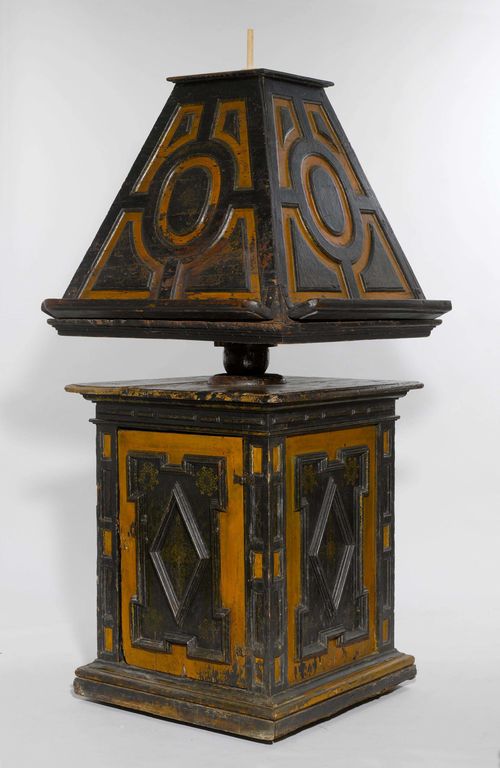BOOK SUPPORT/CONDUCTOR'S STAND,Baroque, Italy, 16th/17th century. Wood with moulding, painted black and brown, and gold. 80x81x180 cm. Painting redone and in part later. Restorations and losses.