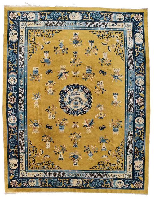 CHINA antique.Yellow central field with a central medallion decorated with a dragon, the entire carpet is patterned with vases in white and blue, dark blue border with trailing flowers, good condition, 330x245 cm.