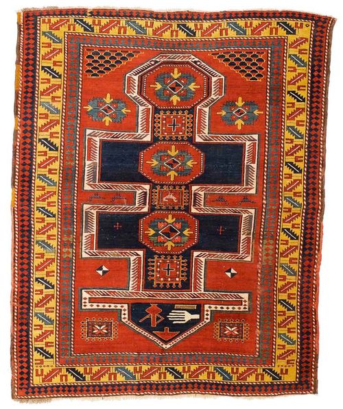 KAZAK old.Rust coloured central field with a cruciform medallion, the entire carpet is geometrically patterned, yellow wine glass border, minimally shortened on one side, signs of wear, 235x190 cm.