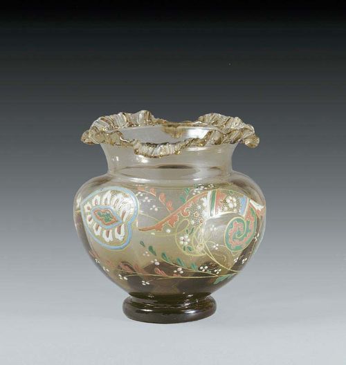 VASE Emile Gallé, Nancy, circa 1898. Translucent brown tinted glass with polychrome enamel-painted foliate decoration edged in gold, the  base inscribed E.Gallé. H 16.5 cm.