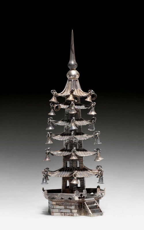 A MINIATURE SILVER PAGODA OF SIX FLOORS ON A PEDESTAL WITH A VERANDAH AND A SMALL STAIR. China, Republic, Height 17 cm.
