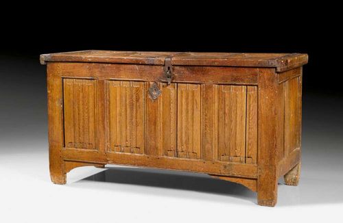 GOTHIC OAK COFFER,France circa 1550. Shaped and finely carved with linen fold carving and fine iron mounts. 148x56x75 cm. Provenance: Zurich private collection