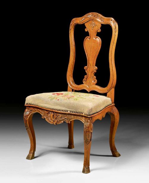 CARVED OAK CHAIR,Louis XV, Aachen-Liege, 18th century Carved with flowers and cartouches and with worn "Gros Point" covers decorated with flowers and leaves. 54x40x45x100 cm. Provenance: Belgian private collection