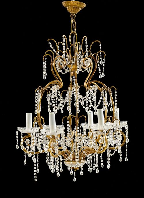 CHANDELIER,Baroque style, 20th century. Pierced, curved gilt metal frame with 6 light branches. Glass hangings designed as strings of pearls. H 62, D 50 cm. Fitted for electricity.