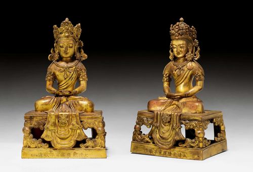 TWO GILT COPPER ALLOY FIGURES OF AMITAYUS. China, Qianlong period, dated 1770. heights 18.5 cm. Aureoles lost. Slightly damaged.