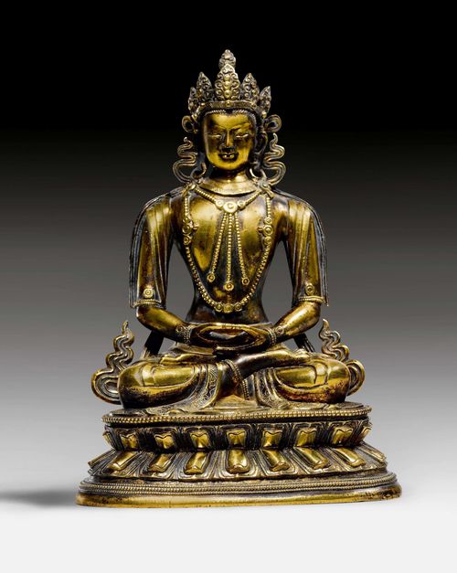 A GILT BRONZE FIGURE OF AMITAYUS. Tibeto-Chinese, 19th c., height 17 cm. Heavily cleaned.