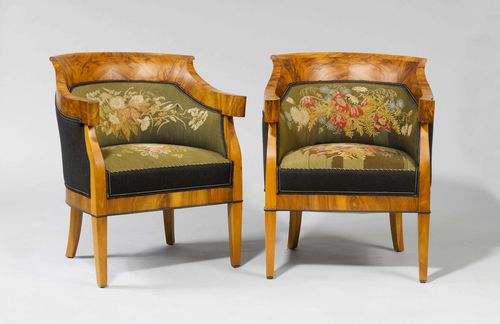 SMALL SUITE OF FURNITURE,Biedermeier, Germany ca. 1830. Walnut and burlwood. Comprising SOFA AND A PAIR OF BERGÈRES. Padded backrest transitioning into the armrests. Gros point cover. Losses in the veneer. Sofa with straight seat on square feet. Rectangular, padded backrest. L172 cm.