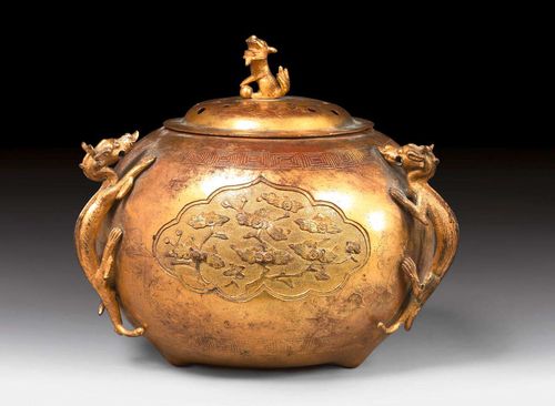 A GILT COPPER CENSER WITH THREE DRAGON HANDLES AND A COVER. China, Qianlong period, height 12.5 cm.