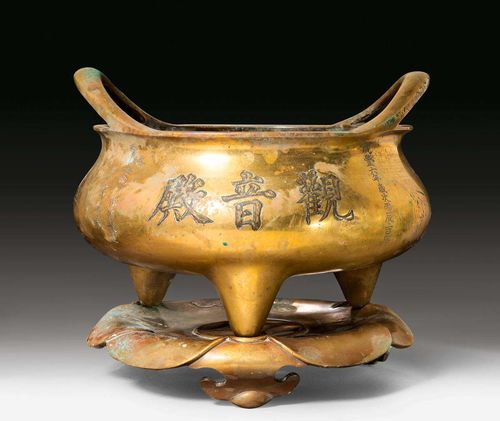 A LARGE BRASS CENSER ON A FLOWERSTAND, INSCRIBED "GUANYIN DIAN". China, Xianfeng period, dated to 1856, diameter 42 cm. Needs cleaning.