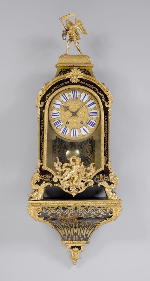 BOULLE CLOCK ON PLINTH,Regence and later, Paris. Wooden case, inlaid with brown tortoiseshell and engraved brass tendrils. Bronze mounts, the top decorated with a Chronos figure. Bronze dial with white enamel cartouches. Later movement with anchor escapement, striking the 1/2-hour on bell. H 98 cm. Some losses. Associated.