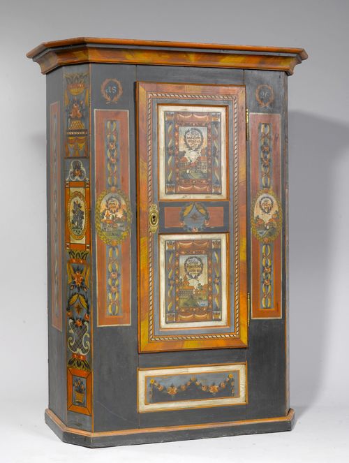 PAINTED WEDDING CUPBOARD, Appenzell, dated 1826. Pinewood, opulently painted with flowers, grapes, vases, garlands and city views on a dark ground. Rectangular body. Front with a door between bevelled corners. 130x59x178 cm. 1 key. Painting in part strongly reworked.