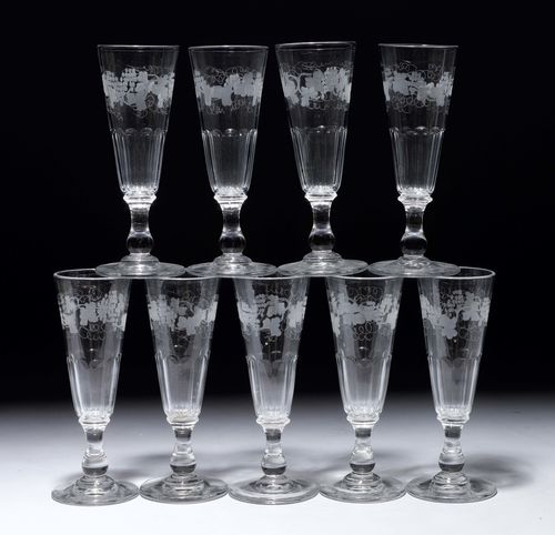 9 CHAMPAGNE FLUTES,France, modern. Faceted, and decorated with tendrils.