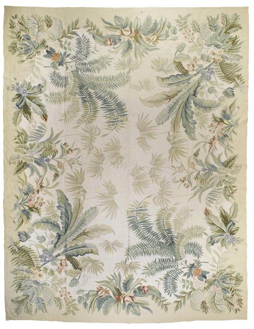 AUBUSSON CHINA.White ground, opulently patterned with plant motifs in delicate pastel colours, beige border, good condition, 390x300 cm.
