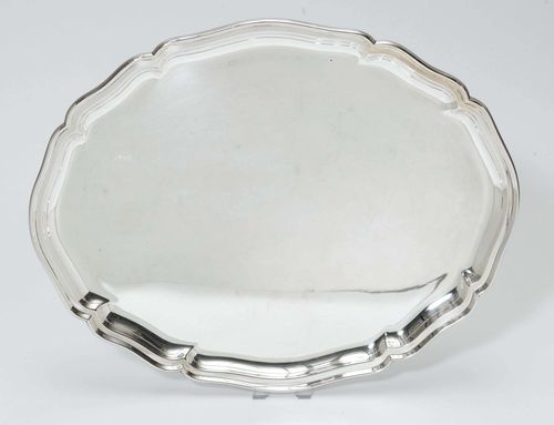 TRAY,Germany, 19th/20th century, company mark Wilkens. Curved, oval form with shaped edge. Smooth mirror. L 45 cm, 1050g.